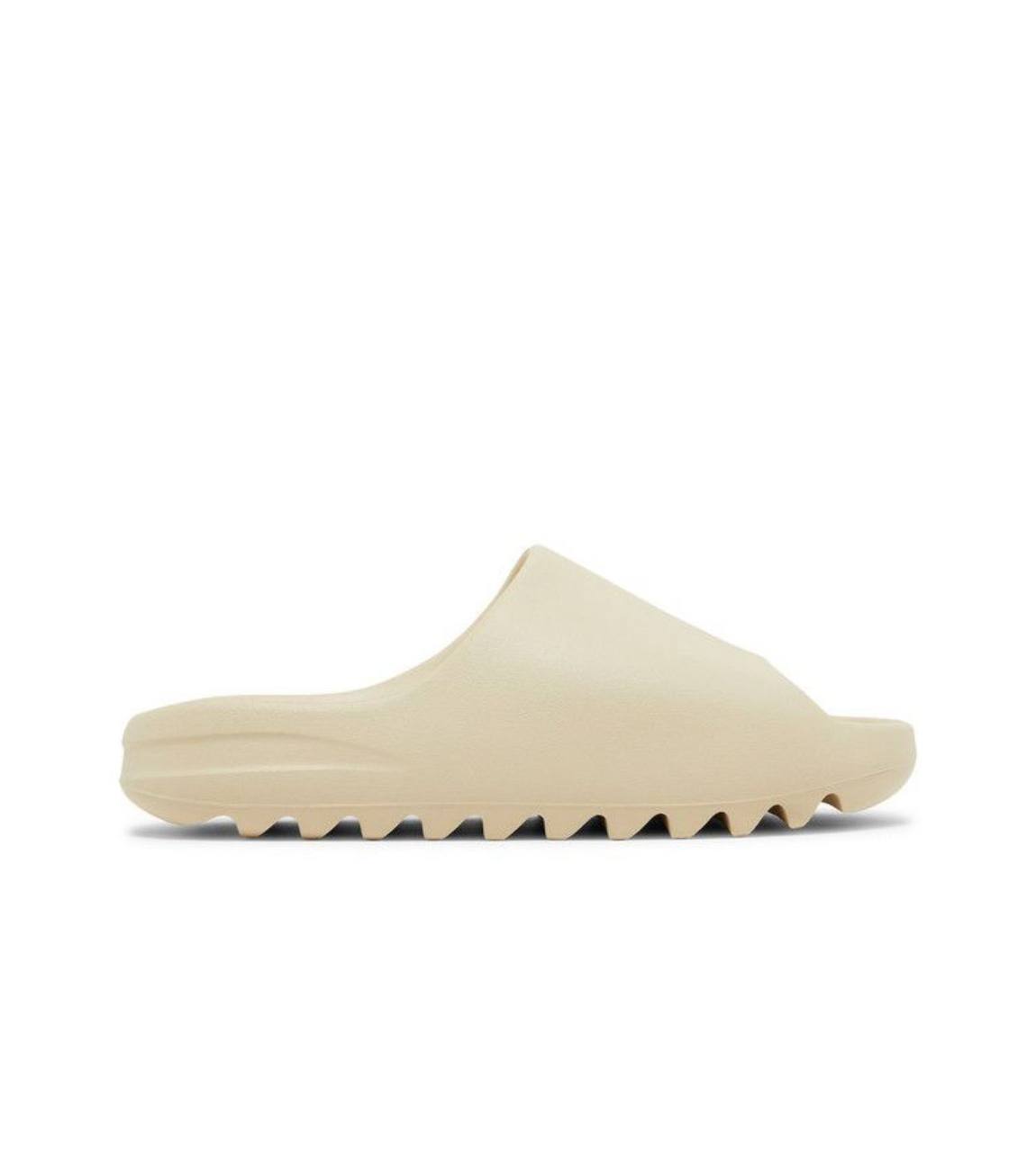 Adidas Yeezy Slide in the "Bone